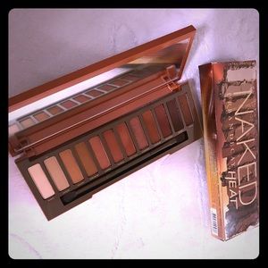 Urban Decay HEAT eyeshadow palette with brush.